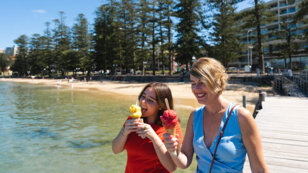 Mother and daughter enjoying ice cream at Manly wharf